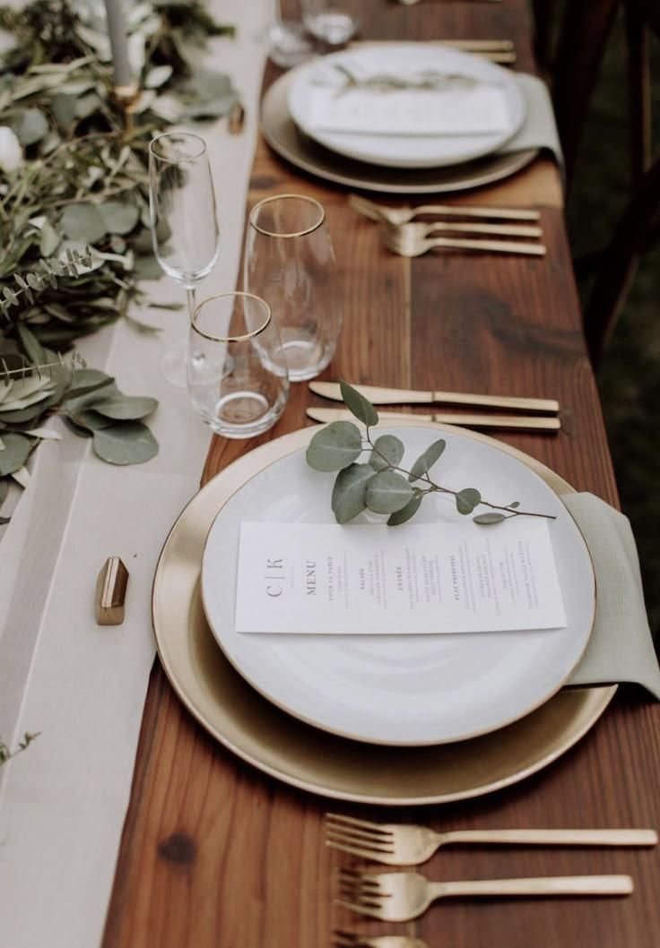 Eucalyptus place setting with gold cutlery